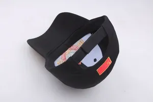 Detail of CCCP baseball cap showing the adjustable velcro strap and internal embroidery