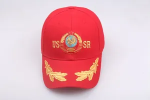 Detailed view of the red USSR baseball cap with gold wheat and emblem embroidery