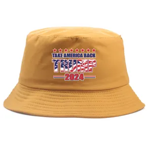 Ginger yellow cotton bucket hat with Take America Back 2024 print and flag design