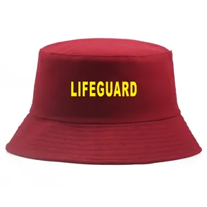 Deep red cotton bucket hat featuring a yellow Lifeguard print for sun protection