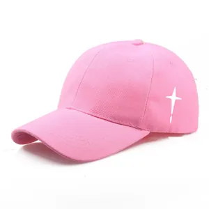 Pink cotton baseball cap with white cross print and curved brim for casual sun protection
