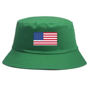 Green cotton bucket hat featuring a printed American flag on the front with flat top design