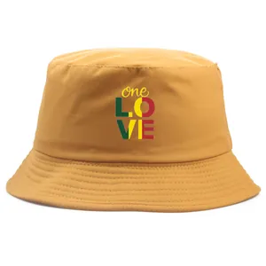 Ginger yellow cotton bucket hat with 'one LOVE' lettering and colorful pan-african print