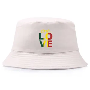 Off-white cotton bucket hat featuring One Love Rasta style printed graphic on front