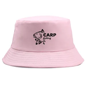 Pink bucket hat featuring a realistic carp fishing graphic and bold text on white background