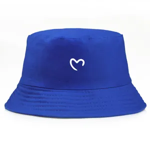 Navy blue cotton bucket hat with a white minimalist heart print and stitched brim
