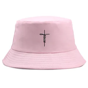 Pink cotton bucket hat featuring a black Jesus cross design for summer outdoor style