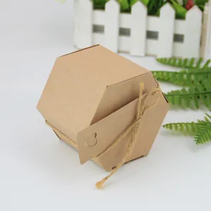 Hexagonal brown kraft paper gift box with heart tag and natural twine tie decoration