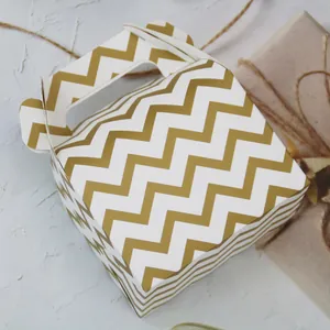 Large pastry box with golden zigzag patterns and integrated handle for cake packaging