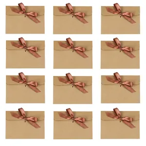 Set of 12 European kraft paper envelopes with brown satin bows for cards and gifts
