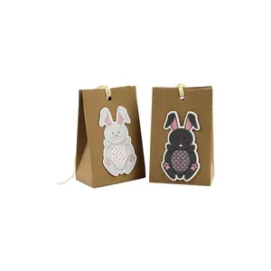 Creative rabbit kraft corrugated gift paper bags with festive bunny cutouts and twine handles