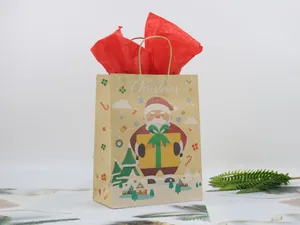 Detail of Christmas kraft paper gift bag with Santa Claus print and red tissue paper