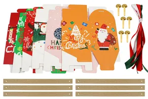 DIY Christmas gift box set with flat-packed paper boxes, ribbons, and gold fasteners