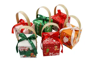 Set of six colorful Christmas gift boxes with festive patterns and silk bows detail