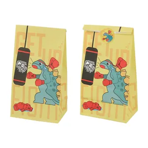 Detail of yellow dinosaur paper food bags with cartoon boxing print and seal stickers