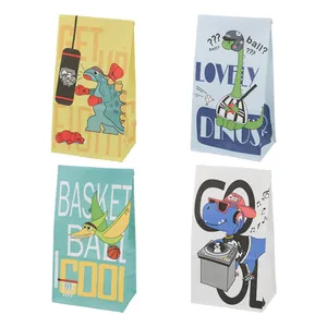 Set of four colorful dinosaur cartoon paper gift bags with flat bottoms for party favors