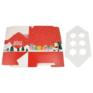 Detail of red Christmas cupcake boxes with 6-hole inserts and festive holiday patterns