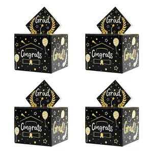 Set of four black and gold graduation gift money boxes with festive tassel designs