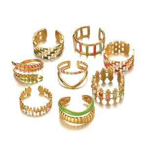 Adjustable gold plated stainless steel rings with colorful enamel geometric designs