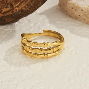 14K gold plated stainless steel open ring featuring a triple-layer skeleton bone design