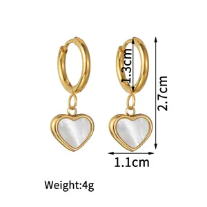 Detail showing gold heart earrings with pearl inlay and dimensions 2.7cm, weight 4g