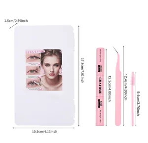 Detailed view of DIY eyelash extension kit with tools and dimensions in pink and white