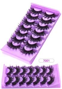 Close-up of 7 pairs of thick 3D faux mink lashes on a purple professional tray
