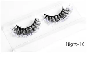 Macro detail of thick black false eyelashes with sparkling purple glitter and Night-16 style