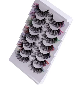 Macro shot of 10 pairs of gradient colored false eyelashes with dense curled texture