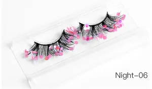 Detail of Night-06 false eyelashes with black fibers and pink hexagonal glitter accents