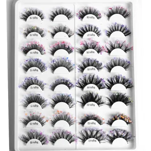 Dramatic 16-pair set of thick false eyelashes with colorful sequins and glitters on tray