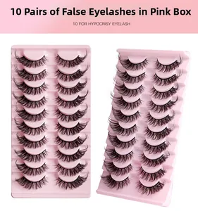 Detailed view of 10 pairs of fluffy cat-eye false lashes on pink tray for thick volume