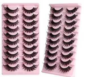 Detail of 20 pairs of wispy black faux mink eyelashes in pink plastic display trays