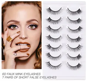 7 pairs of 6D faux mink eyelashes set on tray with natural volume and curling effect