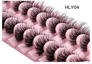 Detailed view of layered cat-eye false eyelashes in style HLY04 on a pink tray