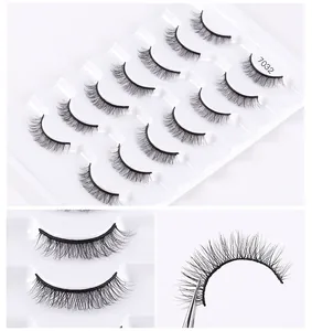 Macro detail of 10 pairs synthetic fiber eyelashes showing natural volume and curly texture