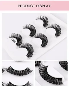 Detail view of 5 pairs of dense Russian D curl false eyelashes in a white plastic tray