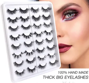 Macro view of 16 pairs thick faux mink eyelashes with handmade voluminous 3D effect
