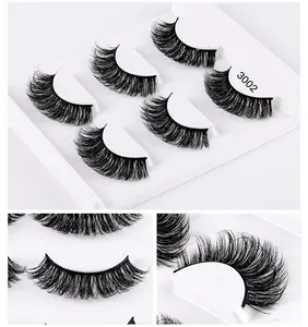 Detail view of 5 pairs of thick Russian D-curl synthetic false eyelashes with root texture