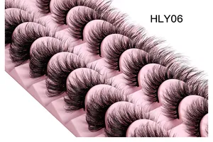 Macro shot of 10 pairs of fox-eye false eyelashes with dense layered volume in style HLY06