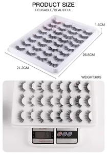 Detailed size and weight chart for 28 pairs of fluffy faux mink eyelashes in a tray