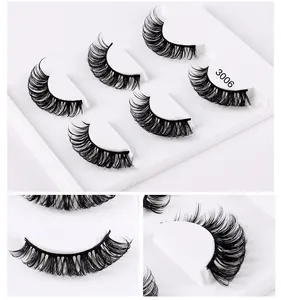 Detail view of Russian D-curl faux mink eyelashes in 5-pair set with crisscross layering