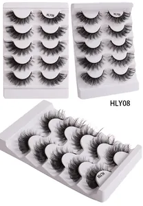 Makroansicht von 5 Paar dichten künstlichen Wimpern im Fox-Stil mit geschwungenen Fasern