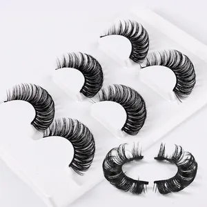 5 pairs of Russian D curl false eyelashes with a thick, voluminous look on a white tray