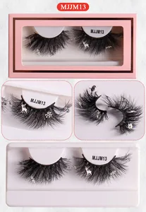Detail of MJJM13 Christmas false eyelashes with reindeer and snowflake sequins