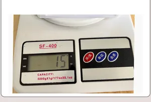 Detail view of SF-400 digital kitchen scale showing LCD display and control buttons