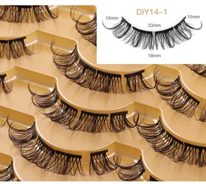 Macro view of D-curl segmented eyelashes on gold tray with length specs 16mm and 18mm