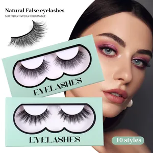 Natural synthetic fiber false eyelashes in mint green packaging box with 3D volume effect