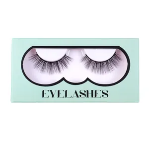 Natural dense synthetic fiber false eyelashes in a mint green box with clear window
