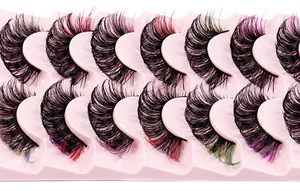 Macro view of 14 pairs rainbow gradient false eyelashes with Russian D curl in a pink tray